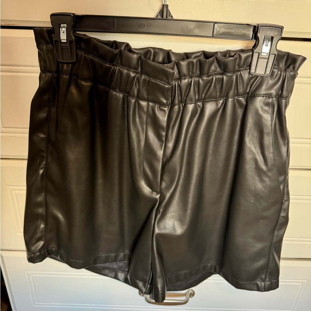 Faux leather cinch high waisted shorts. Size small.